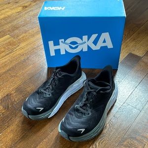 HOKA Women’s Arabia size 7B Black with white sole